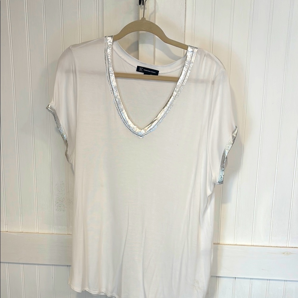 I.N.C. White w/Silver Accents at neck & sleeve. Short sleeved, V-neck size T XXL